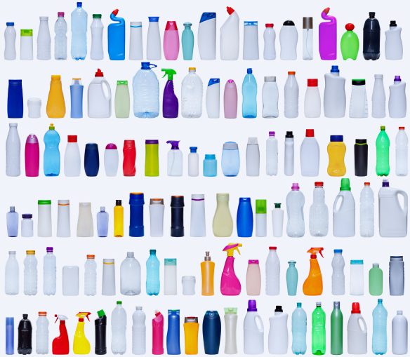 stock photo of dozens of bottles in rows, all different sizes, shapes and colours