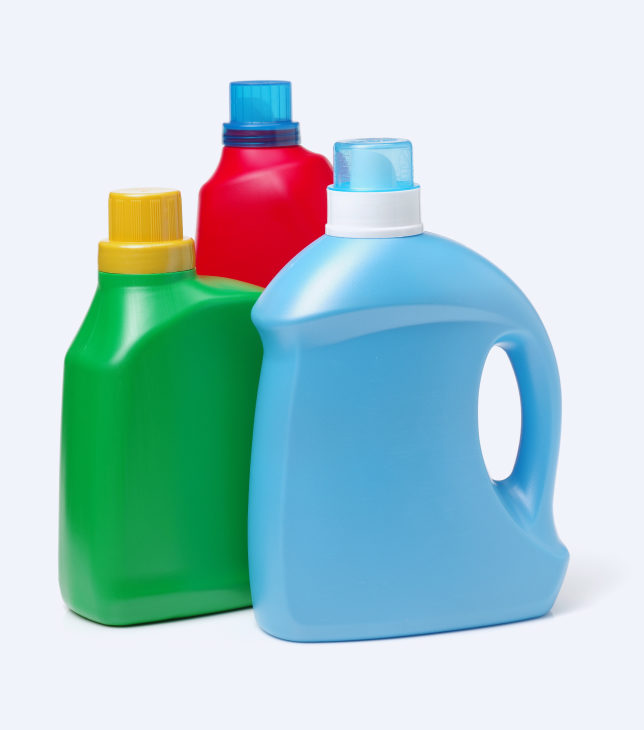 3 laundry detergent bottles in different colours